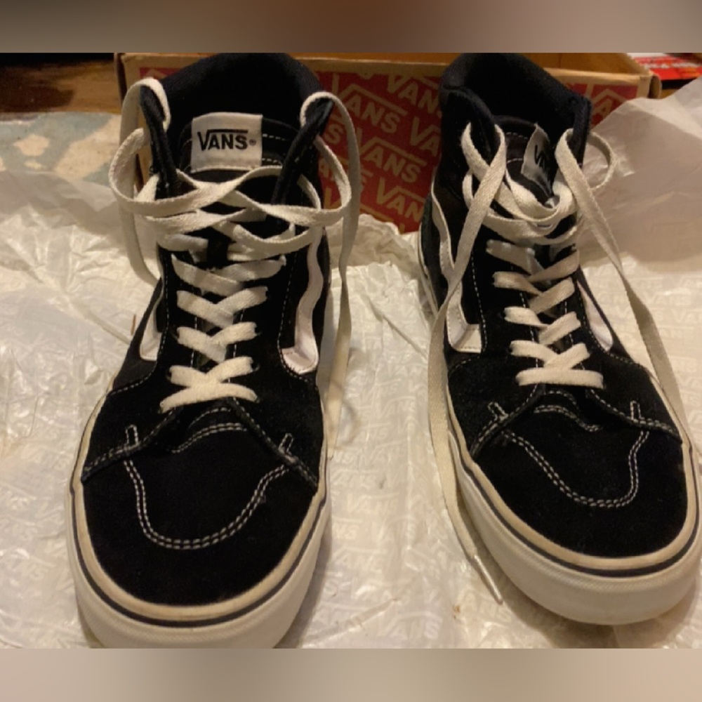 They are vans black and white high tops men size 9.0